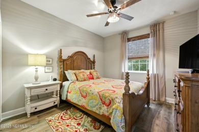 Embrace upscale, waterside living in this stunning two-story, 5