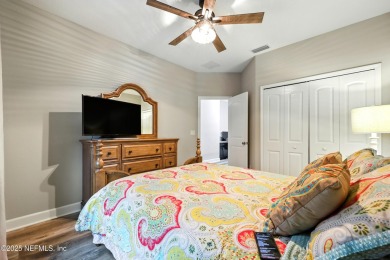 Embrace upscale, waterside living in this stunning two-story, 5