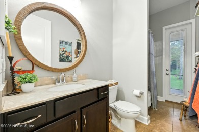 Embrace upscale, waterside living in this stunning two-story, 5