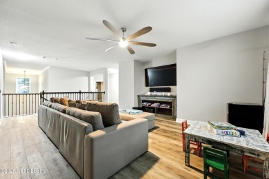 Embrace upscale, waterside living in this stunning two-story, 5