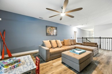 Embrace upscale, waterside living in this stunning two-story, 5