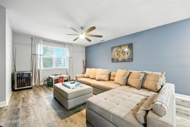 Embrace upscale, waterside living in this stunning two-story, 5