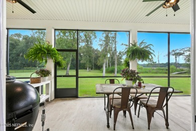 Embrace upscale, waterside living in this stunning two-story, 5