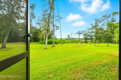 Embrace upscale, waterside living in this stunning two-story, 5