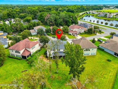 Embrace upscale, waterside living in this stunning two-story, 5