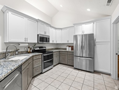 Welcome to easy, main-level living in the warm and welcoming