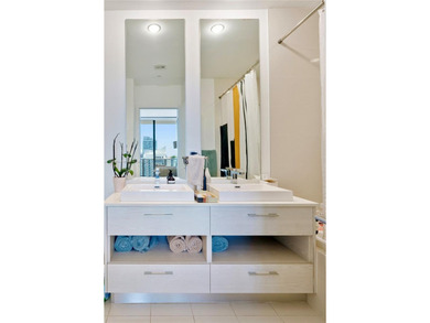 Unmatched 42nd-floor views of Miami's skyline and Coconut Grove