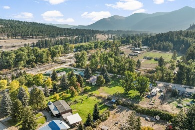 Sitting on nearly a half-acre with water rights to Petty Creek