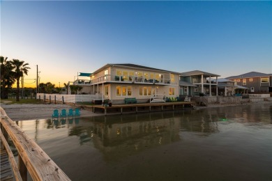 Tucked behind the gates of Sea Shell Shores, lies a home of