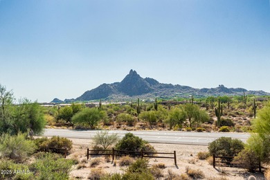 Picturesque Pinnacle Peak mountain, sunset and city light views