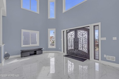 Discover waterfront living at its finest in this brand-new