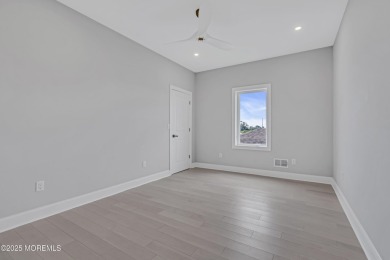 Discover waterfront living at its finest in this brand-new