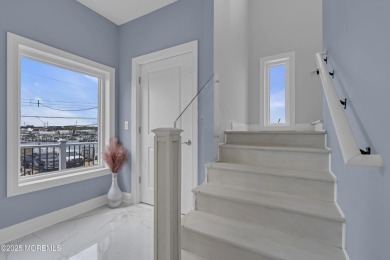 Discover waterfront living at its finest in this brand-new