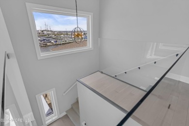 Discover waterfront living at its finest in this brand-new