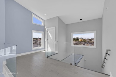 Discover waterfront living at its finest in this brand-new