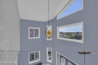 Discover waterfront living at its finest in this brand-new