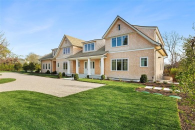 Down a perfectly manicured private road, discover 171 Oneck Lane