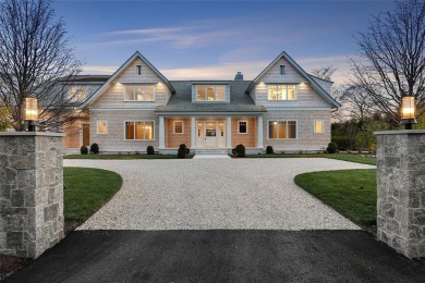 Down a perfectly manicured private road, discover 171 Oneck Lane