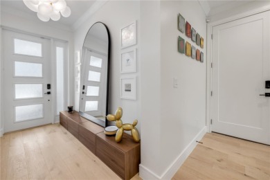 Experience the ultimate in luxury waterfront living with this