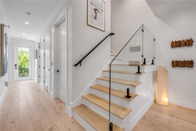 Experience the ultimate in luxury waterfront living with this