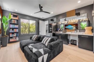 Experience the ultimate in luxury waterfront living with this