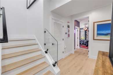 Experience the ultimate in luxury waterfront living with this