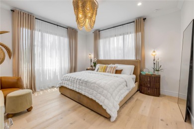 Experience the ultimate in luxury waterfront living with this