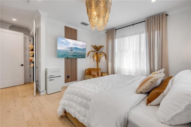 Experience the ultimate in luxury waterfront living with this