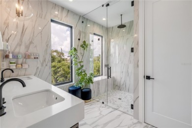 Experience the ultimate in luxury waterfront living with this