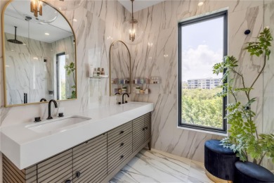 Experience the ultimate in luxury waterfront living with this