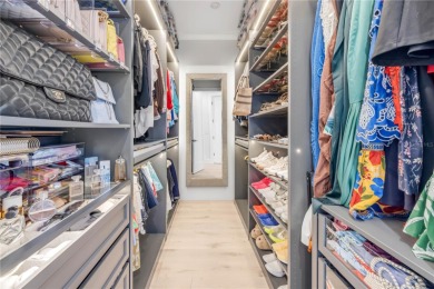 Experience the ultimate in luxury waterfront living with this