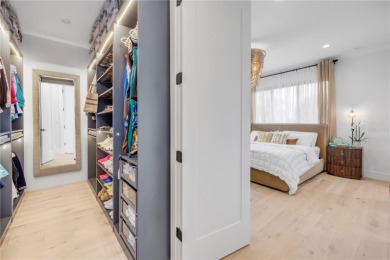 Experience the ultimate in luxury waterfront living with this