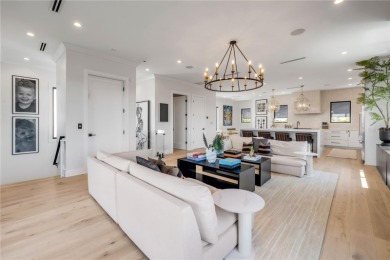 Experience the ultimate in luxury waterfront living with this