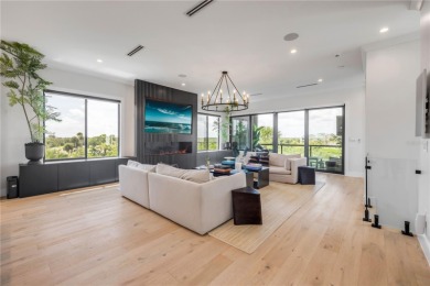 Experience the ultimate in luxury waterfront living with this