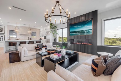 Experience the ultimate in luxury waterfront living with this