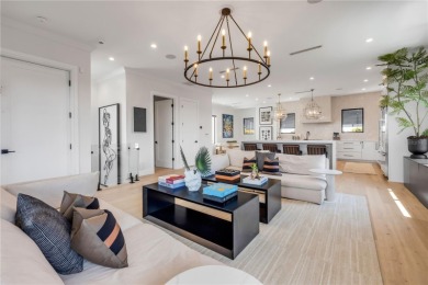 Experience the ultimate in luxury waterfront living with this