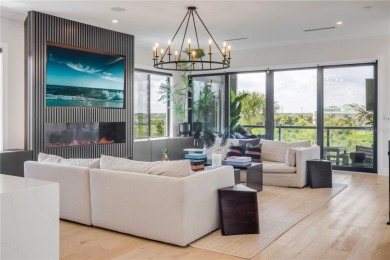 Experience the ultimate in luxury waterfront living with this