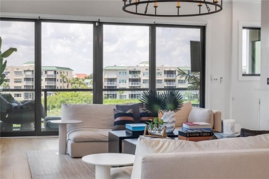 Experience the ultimate in luxury waterfront living with this