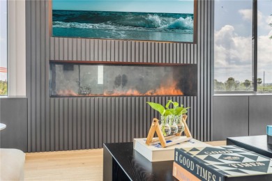 Experience the ultimate in luxury waterfront living with this