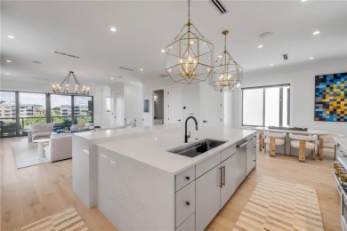 Experience the ultimate in luxury waterfront living with this