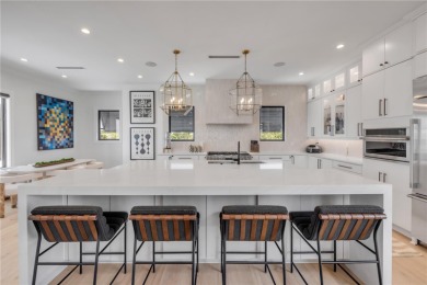 Experience the ultimate in luxury waterfront living with this