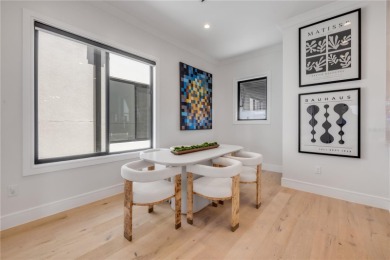 Experience the ultimate in luxury waterfront living with this