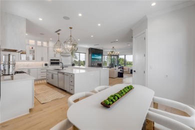 Experience the ultimate in luxury waterfront living with this