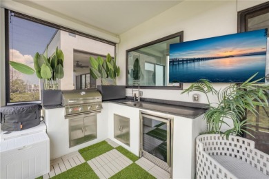 Experience the ultimate in luxury waterfront living with this