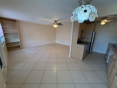 Welcome to this 2-bedroom, 1.5-bath, 1008 sq ft condo in the