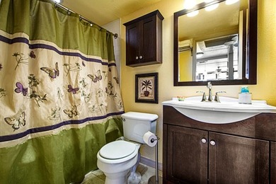 Welcome to Kona Pacific! This fully furnished turn-key top floor