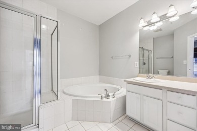 Bright and beautiful corner unit condo facing common area at