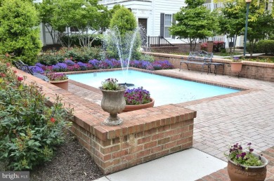 Bright and beautiful corner unit condo facing common area at