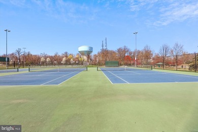 Bright and beautiful corner unit condo facing common area at