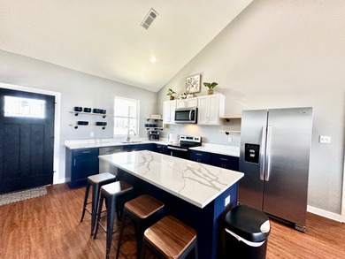 Welcome to your dream waterfront retreat in the desirable